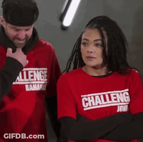 A Woman Is Wearing A Red Shirt That Says The Challenge GIF