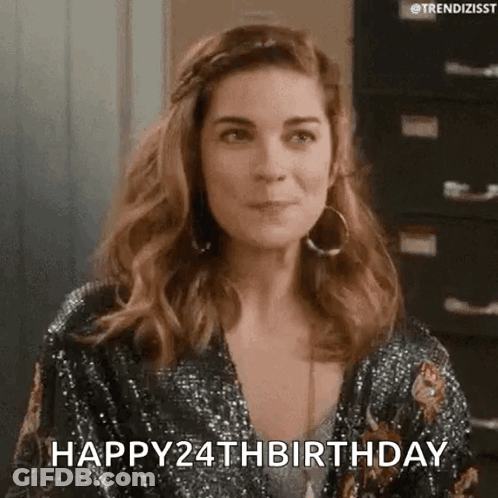 A Woman Is Wearing A Sequined Dress And Hoop Earrings And Saying Happy 24Th Birthday . GIF