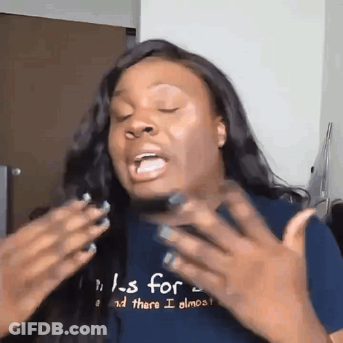 A Woman Is Wearing A Shirt That Says Ls For And There I Almost . GIF