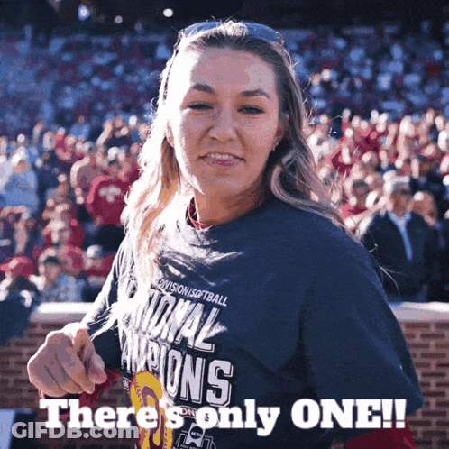 A Woman Is Wearing A Shirt That Says National Champions On It GIF