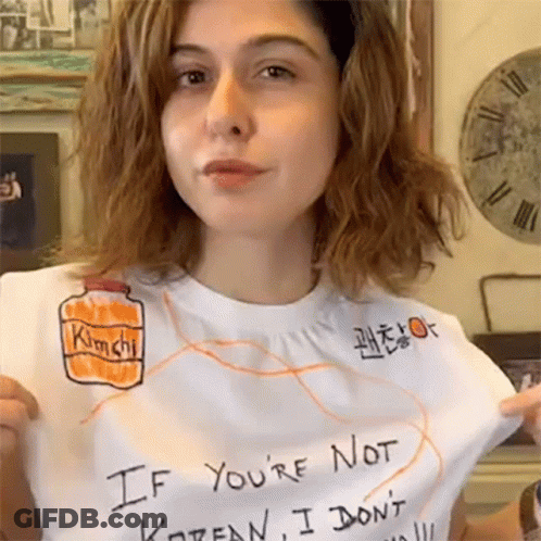 A Woman Is Wearing A T-Shirt That Says " If You 'Re Not Korean I Don 'T " GIF