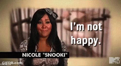 A Woman Is Wearing A Tiara And Saying `` I 'M Not Happy '' . GIF