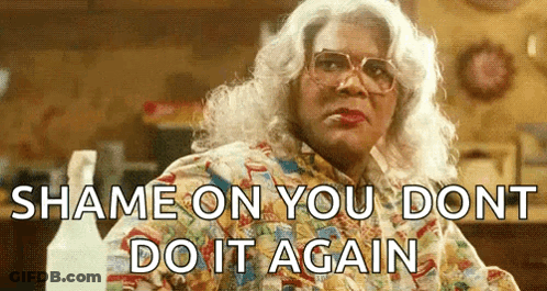 A Woman Is Wearing Glasses And A Colorful Shirt And Says `` Shame On You Dont Do It Again '' GIF
