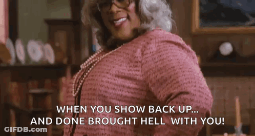 A Woman Is Wearing Glasses And A Pink Shirt And Says When You Show Back Up ... And Done Brought Hell With You ! GIF