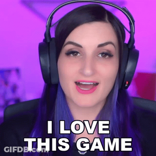 A Woman Is Wearing Headphones And Says I Love This Game GIF