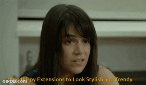 A Woman Is Wearing Wispy Extensions To Look Stylish And Trendy .. GIF