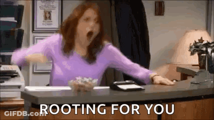 Yawning Woman Sitting At Desk With Rooting For You Text GIF
