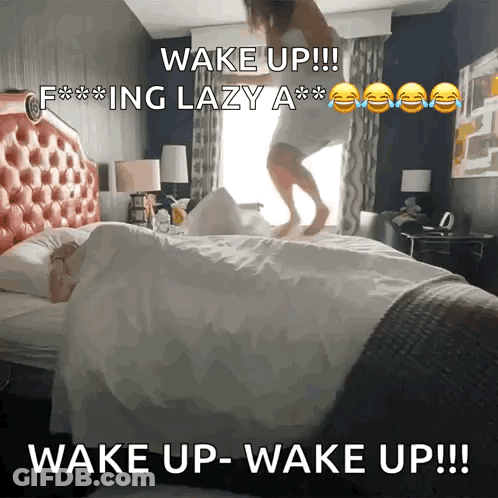 A Woman Jumping On A Bed With The Caption Wake Up GIF