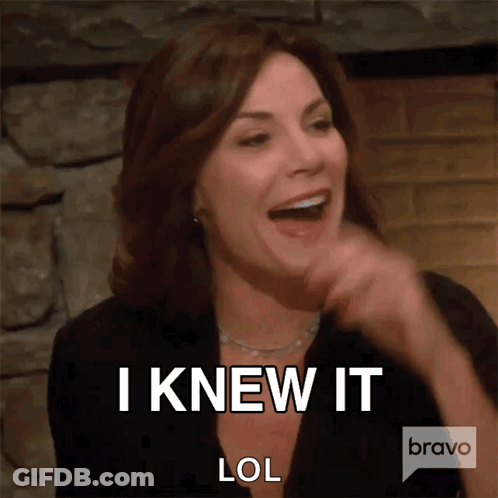 A Woman Laughs And Says " I Knew It LOL " GIF