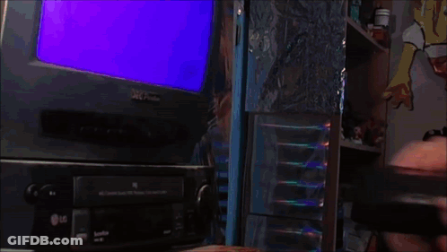 A Woman Laughs In Front Of An Lg Television GIF