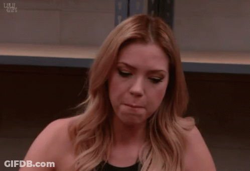 A Woman Laying Her Head On A Table With The Words Lulu GIFs On The Bottom Right GIF