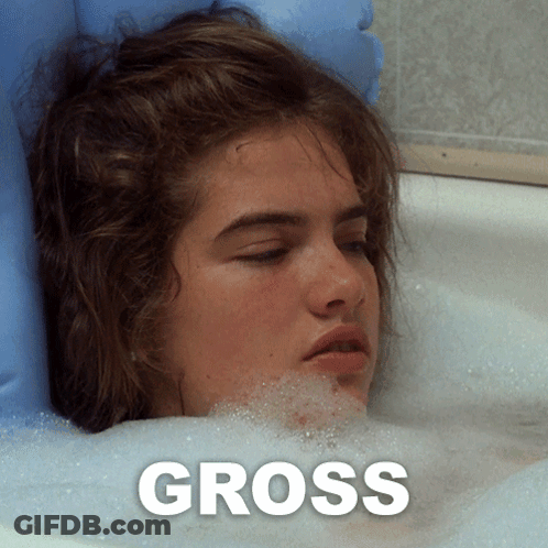 A Woman Laying In A Bathtub With The Word Gross On The Bottom GIF