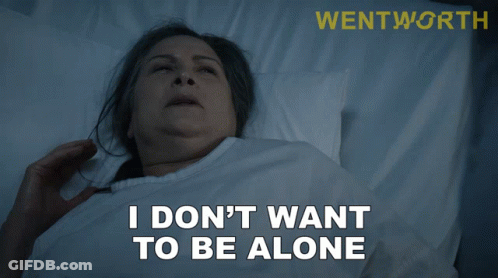 A Woman Laying In A Hospital Bed With The Words " I Don 'T Want To Be Alone " GIF