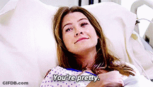 A Woman Laying In A Hospital Bed With The Words You 'Re Pretty Above Her GIF