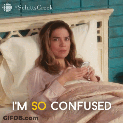 A Woman Laying In Bed With The Words I 'M So Confused In Yellow GIF