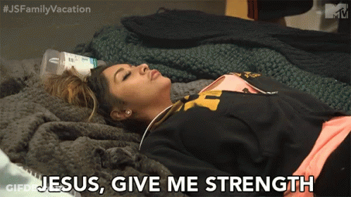 A Woman Laying On A Bed With Jesus Give Me Strength Written On Her Face GIF