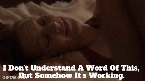 A Woman Laying On A Bed With The Words I Don T Understand A Word Of This But Somehow It 'S Working Below Her GIF