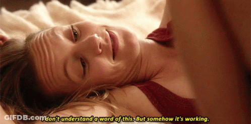 A Woman Laying On A Bed With The Words I Don 'T Understand A Word Of This GIF