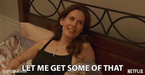 A Woman Laying On A Bed With The Words Let Me Get Some Of That GIF