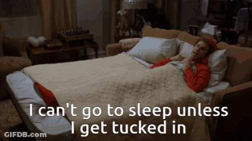A Woman Laying On A Couch With The Words " I Can 'T Go To Sleep Unless I Get Tucked In " Above Her GIF