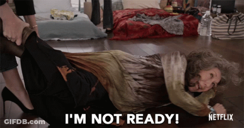 A Woman Laying On The Floor With The Words I 'M Not Ready On The Bottom GIF