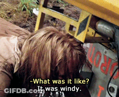 A Woman Laying On The Ground With The Words What Was It Like It Was Windy On The Bottom GIF