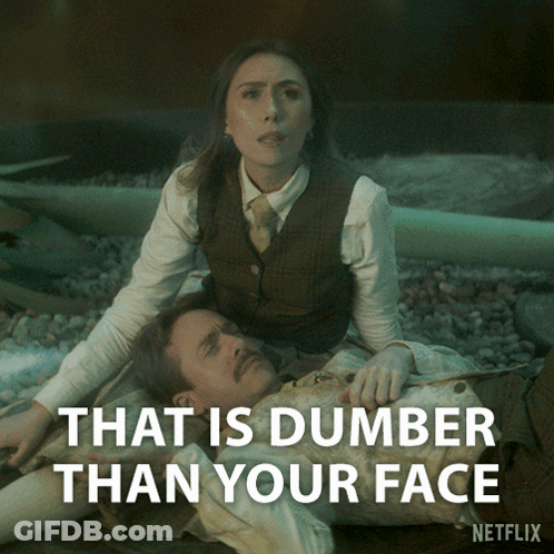 A Woman Laying On Top Of A Man With The Words That Is Dumber Than Your Face On The Bottom GIF