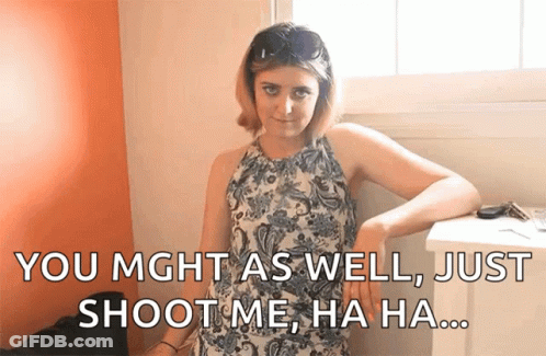 A Woman Leaning Against A Wall With A Caption That Says You Might As Well Just Shoot Me GIF