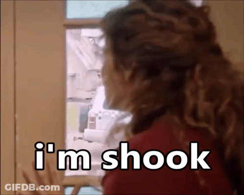 A Woman Looking Into A Refrigerator With The Words I 'M Shook Written On It GIF