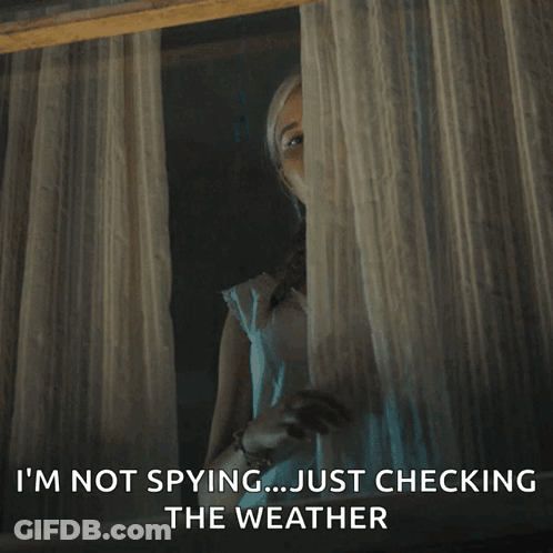 A Woman Looking Out Of A Window With The Words " I 'M Not Spying Just Checking The Weather " Below Her GIF