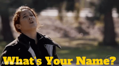 A Woman Looking Up With The Words What 'S Your Name Written Below Her GIF