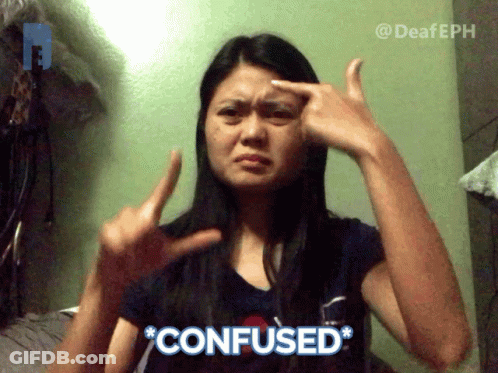 A Woman Making A Confused Sign With Her Hands On Her Forehead GIF