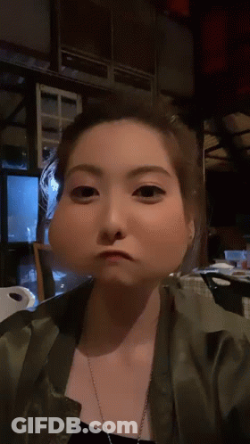 A Woman Making A Funny Face With A Big Nose GIF