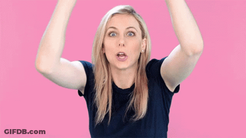 A Woman Making A Surprised Face In Front Of The Word Ghoul GIF