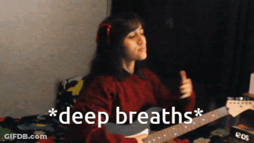 A Woman Playing A Guitar With The Words " Deep Breaths " Written On The Bottom GIF
