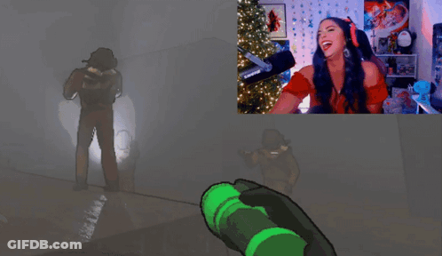 A Woman Playing A Video Game With A Flashlight GIF