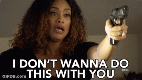 A Woman Pointing A Gun With The Words I Don T Wanna Do This With You Behind Her GIF