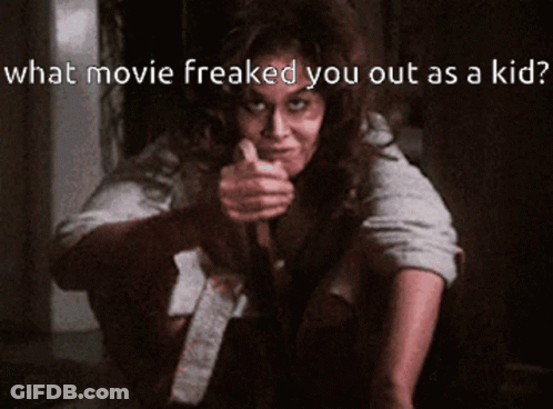 A Woman Pointing At The Camera With The Words What Movie Freaked You Out As A Kid GIF