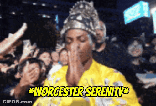 A Woman Praying In Front Of A Crowd With The Words Worcester Serenity On The Bottom GIF