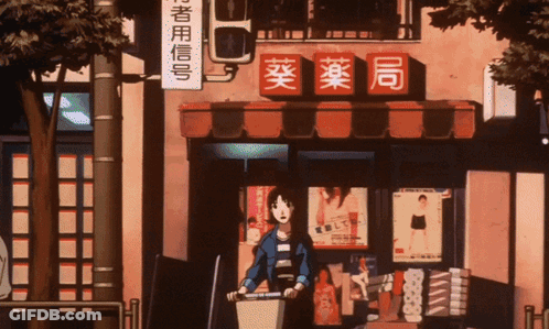 A Woman Pushing A Bicycle In Front Of A Store With Chinese Writing GIF