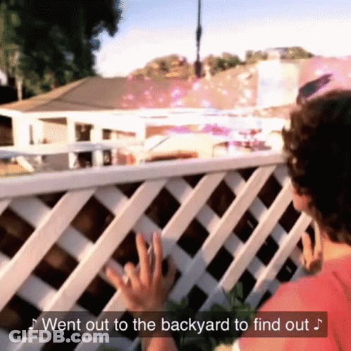 A Woman Reaches Out To Touch A White Lattice Fence With The Words " Went Out To The Backyard To Find Out " Above Her GIF