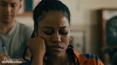 A Woman Rests Her Head On Her Hand And The Word Boogie Is On The Bottom Right GIF