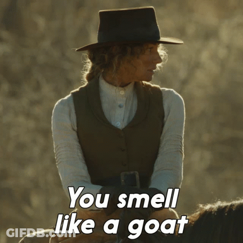 A Woman Riding A Horse With The Words You Smell Like A Goat GIF
