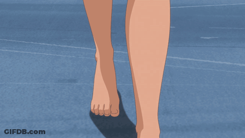 A Woman 'S Bare Feet Are Shown On A Blue Background GIF
