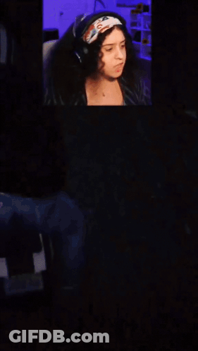 A Woman 'S Face Is Behind The Words Wasted GIF