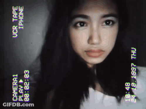 Woman's Face On Camera Tape Saying Camera 1 GIF