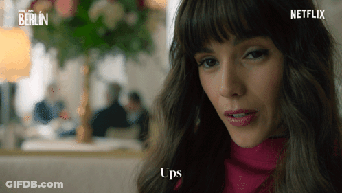 A Woman 'S Face Is Shown In A Netflix Advertisement For Berlin GIF