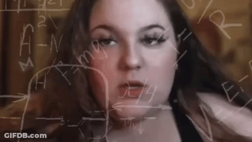 A Woman 'S Face Is Surrounded By Mathematical Equations On A Whiteboard . GIF
