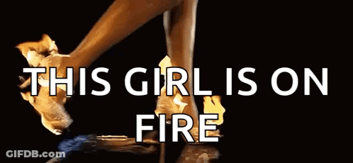A Woman 'S Feet Are On Fire And The Words `` This Girl Is On Fire '' Are Written Above Them . GIF
