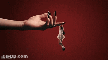 A Woman 'S Hand Is Holding A Smaller Woman 'S Hand With Imgflip.com At The Bottom GIF